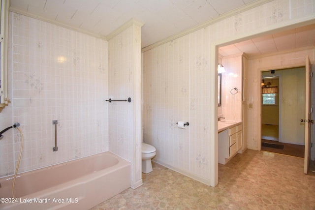 full bathroom with ornamental molding, vanity, shower / tub combination, tile walls, and toilet