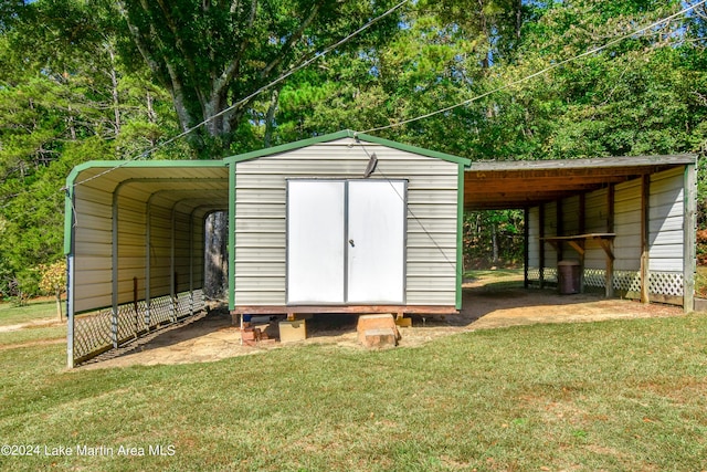 view of outbuilding featuring a carport and a lawn