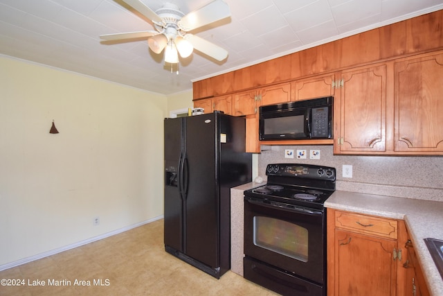 kitchen with ceiling fan, ornamental molding, and black appliances