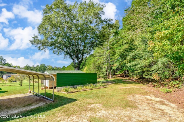 view of yard with a carport