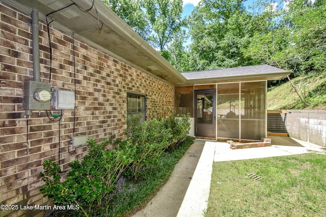 514 Sleepy Holw, Alexander City, AL 35010 - entrance to property featuring brick siding and roof with shingles