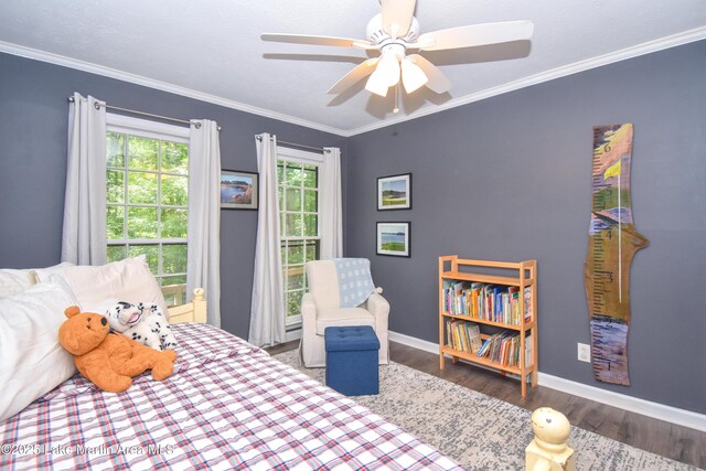 514 Sleepy Holw, Alexander City, AL 35010 - bedroom with wood finished floors, crown molding, and a ceiling fan