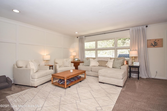 514 Sleepy Holw, Alexander City, AL 35010 - living area featuring a decorative wall, light colored carpet, crown molding, and recessed lighting