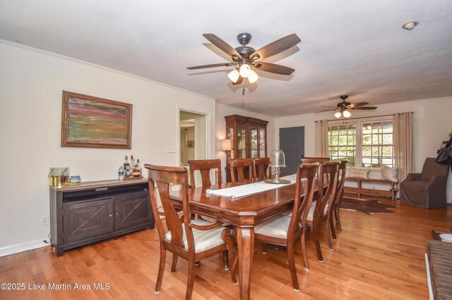 514 Sleepy Holw, Alexander City, AL 35010 - dining area with a ceiling fan and light wood-style floors
