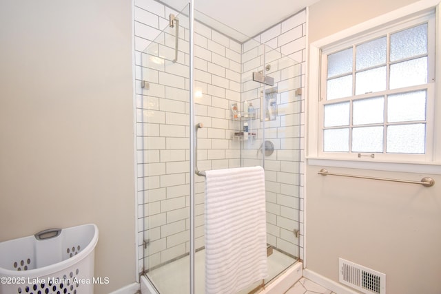 bathroom featuring an enclosed shower