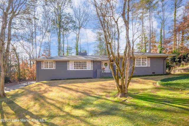 single story home featuring a front yard