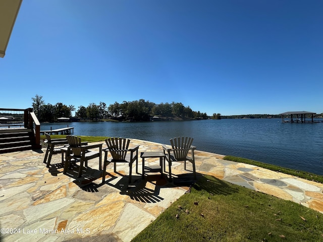 view of patio featuring a water view