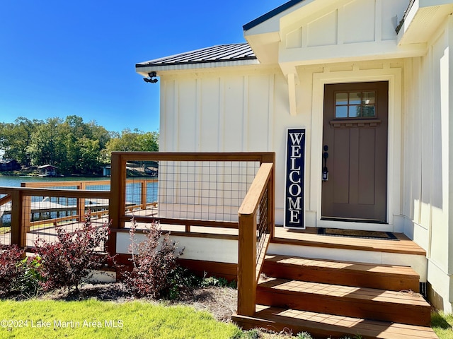 property entrance featuring a water view