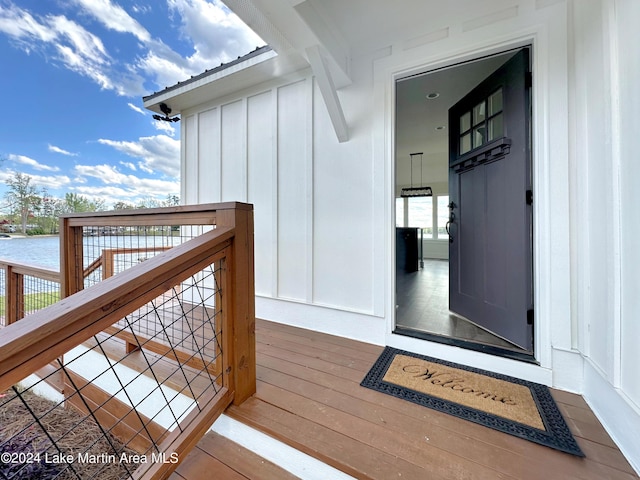 wooden deck with a water view