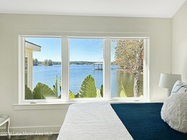 bedroom with a water view