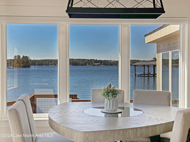 dining area featuring a water view