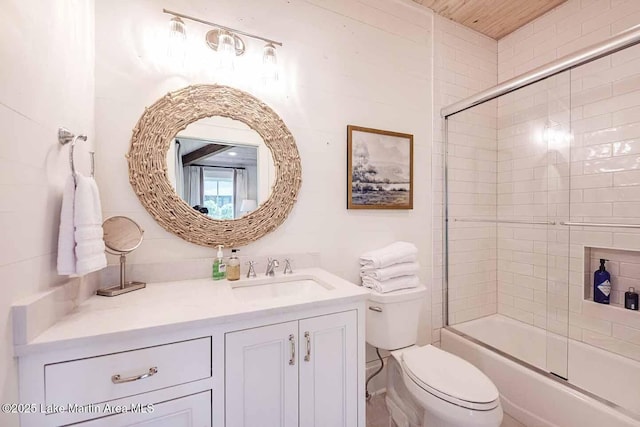 326 Bulgers Mill Loop, Alexander City, AL 35010 - full bathroom with toilet, vanity, and bath / shower combo with glass door