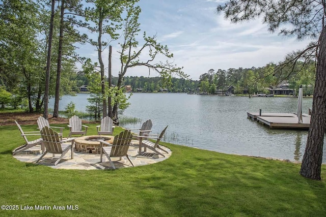 326 Bulgers Mill Loop, Alexander City, AL 35010 - view of grassy yard featuring an outdoor fire pit, a floating dock, and a water view
