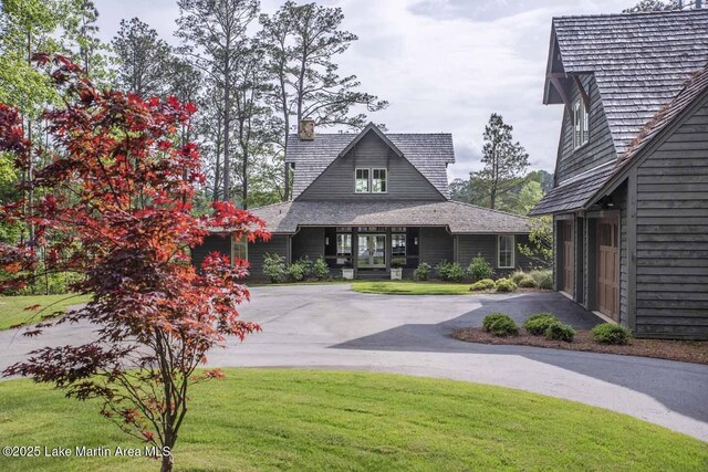 326 Bulgers Mill Loop, Alexander City, AL 35010 - view of property's community with asphalt driveway and a yard