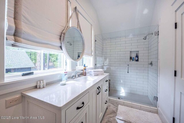 326 Bulgers Mill Loop, Alexander City, AL 35010 - full bathroom with a stall shower, vanity, and vaulted ceiling