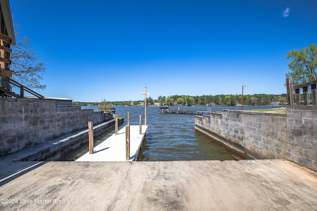 dock area featuring a water view