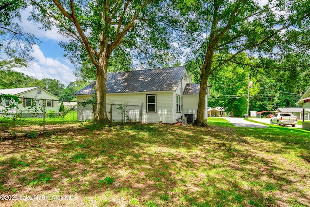 1706 Simpson St, Alexander City, AL 35010 - back of house with a metal roof