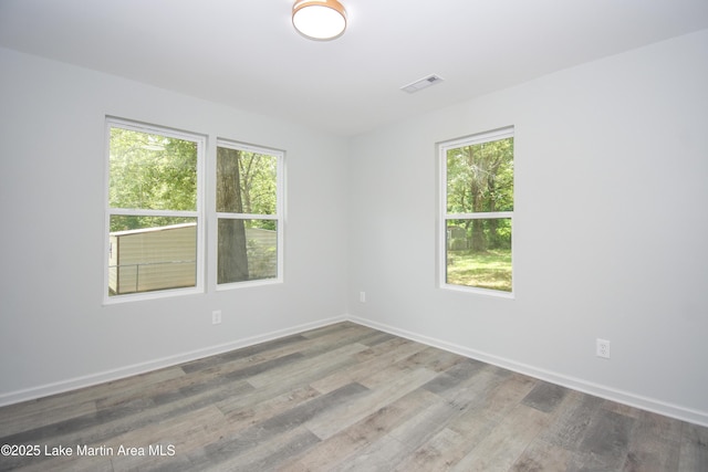 1706 Simpson St, Alexander City, AL 35010 - unfurnished room with wood finished floors and baseboards