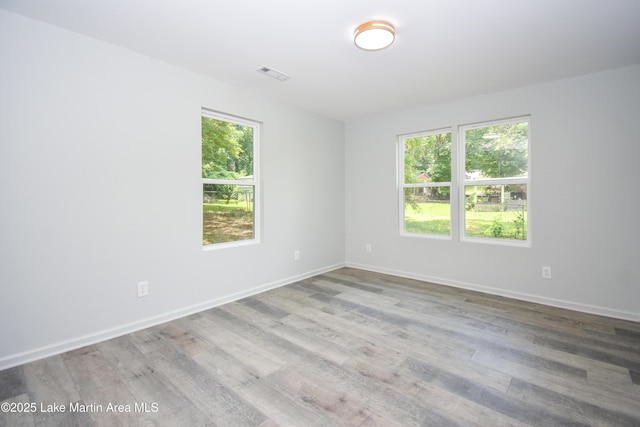1706 Simpson St, Alexander City, AL 35010 - empty room featuring wood finished floors and baseboards