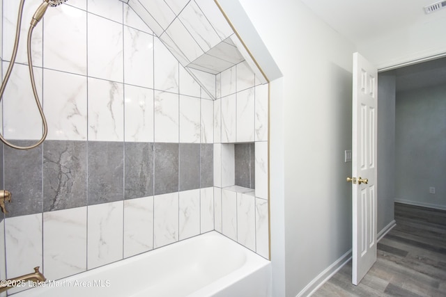 1706 Simpson St, Alexander City, AL 35010 - full bathroom with wood finished floors and baseboards