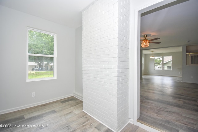 1706 Simpson St, Alexander City, AL 35010 - unfurnished room featuring wood finished floors and ceiling fan