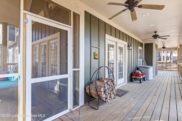 wooden deck with ceiling fan