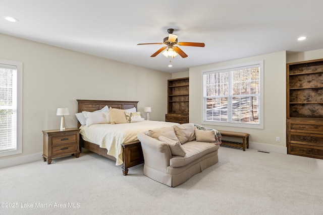 bedroom with recessed lighting, light carpet, ceiling fan, and baseboards