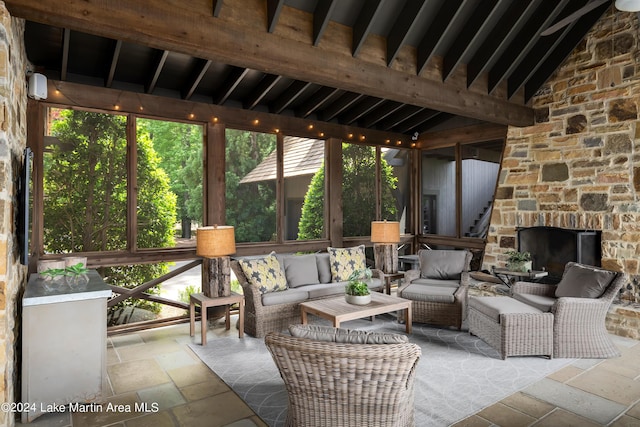 view of patio / terrace featuring an outdoor living space with a fireplace