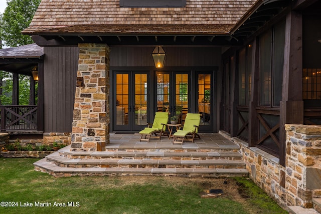 property entrance with french doors and a porch