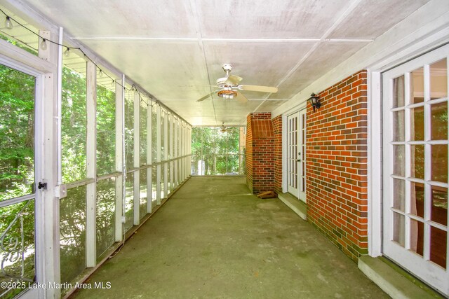 605 Noble Rd, Tallassee, AL 36078 - split level home with brick siding, a carport, and a front yard