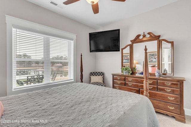 bedroom featuring ceiling fan and lofted ceiling