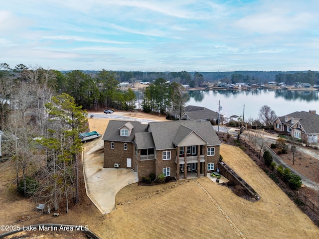 bird's eye view with a water view