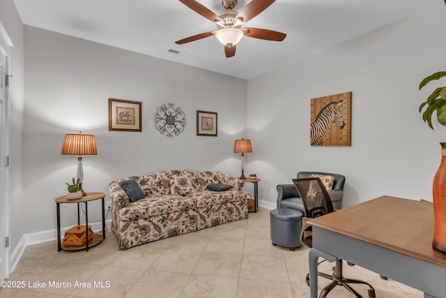 tiled office featuring ceiling fan