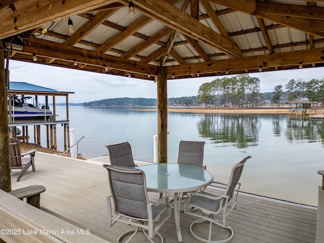 view of dock featuring a water view and a gazebo