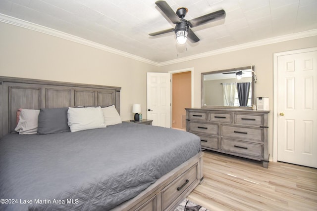 bedroom with ceiling fan, crown molding, and light wood-type flooring