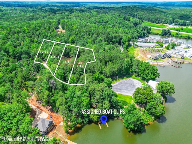 593 Elks Pkwy, Alexander City, AL 35010 - aerial view of property and surrounding area with a nearby body of water and property boundaries highlighted