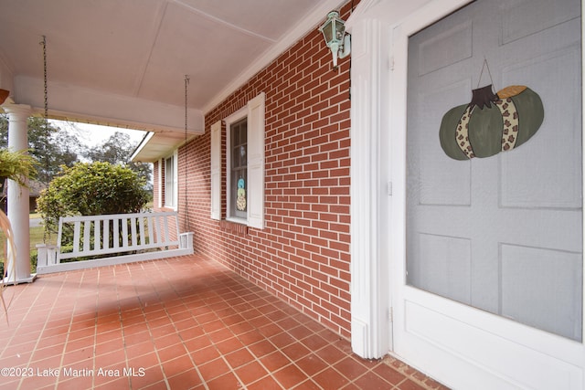 view of patio featuring a porch