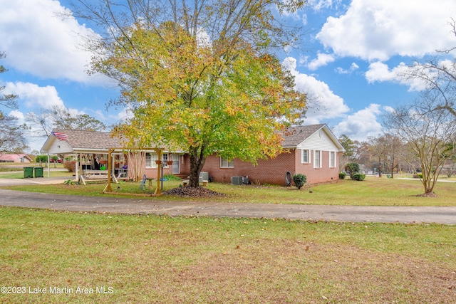 view of front of home with a front lawn