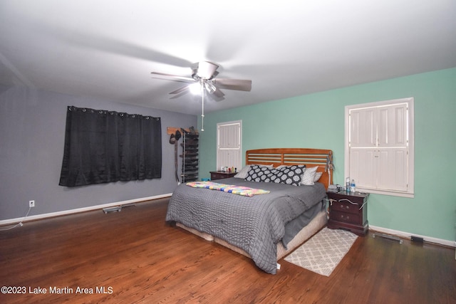 bedroom with wood-type flooring and ceiling fan