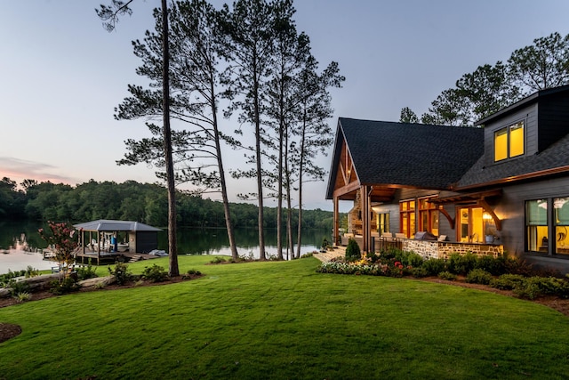 view of yard featuring a water view