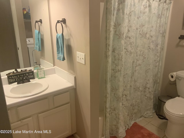 bathroom featuring vanity, curtained shower, tile patterned floors, and toilet