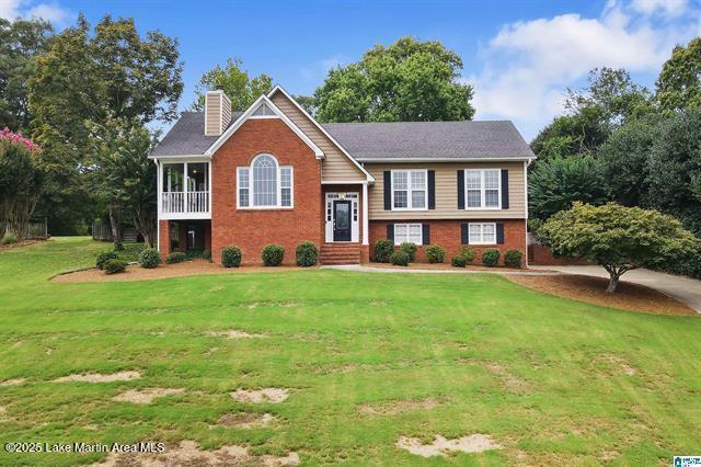 4376 Heritage View Rd, Birmingham, AL 35242 - raised ranch with a chimney, brick siding, and a front yard