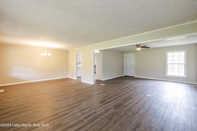 unfurnished room featuring ceiling fan with notable chandelier, a textured ceiling, and dark hardwood / wood-style floors