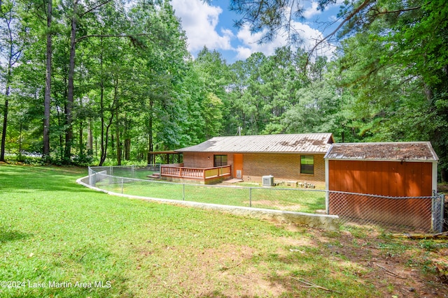 view of yard featuring a wooden deck