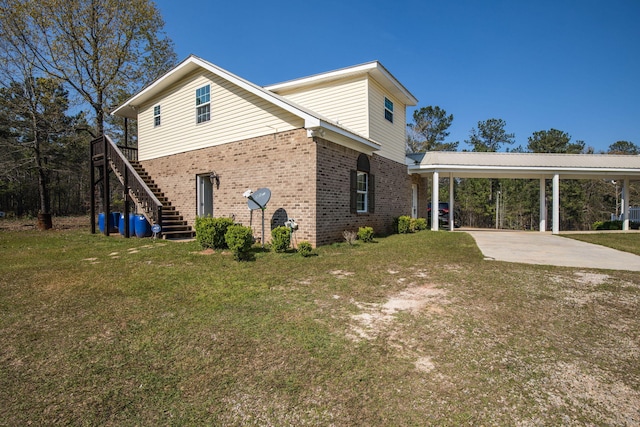 view of property exterior featuring a yard and a carport