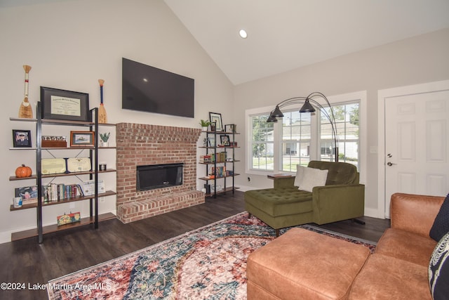 living room featuring a fireplace, high vaulted ceiling, and dark wood-type flooring