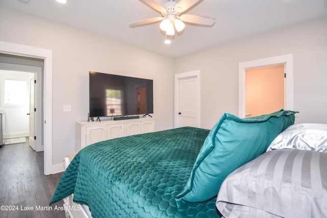 bedroom featuring hardwood / wood-style flooring and ceiling fan