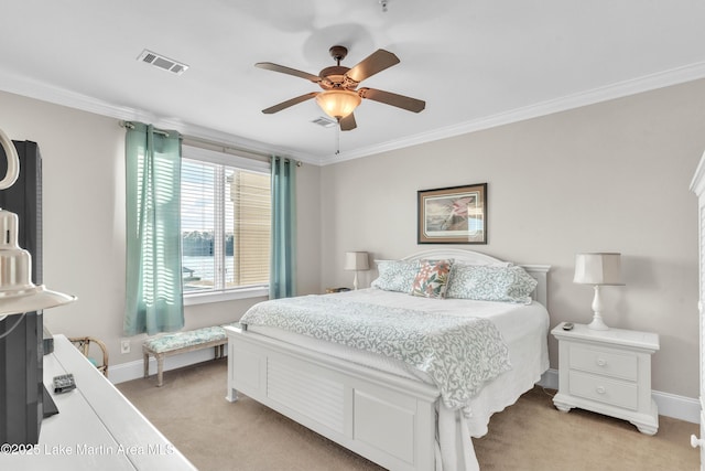bedroom featuring light carpet, baseboards, visible vents, a ceiling fan, and crown molding