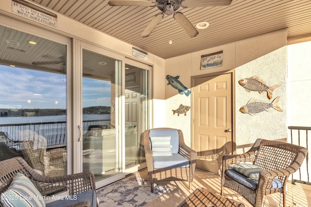 exterior space featuring ceiling fan