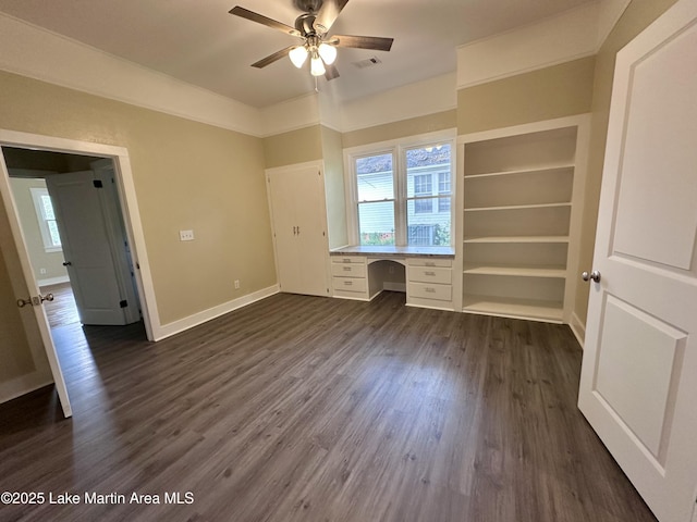 104 Central Blvd, East Tallassee, AL 36078 - unfurnished office with built in study area, plenty of natural light, a ceiling fan, and dark wood finished floors